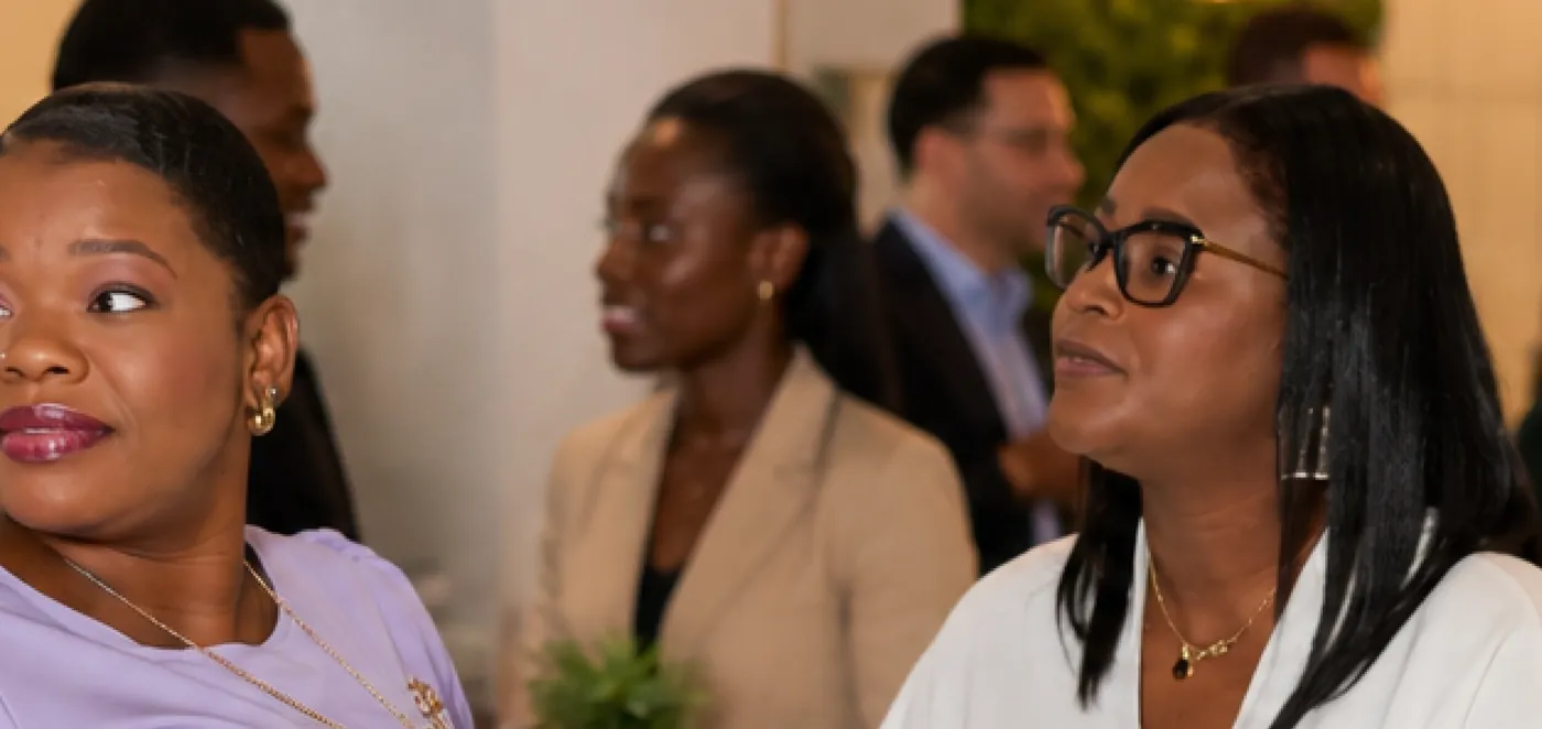 Guests talking together at a LYS & Co. networking evening in Providence, Rhode Island